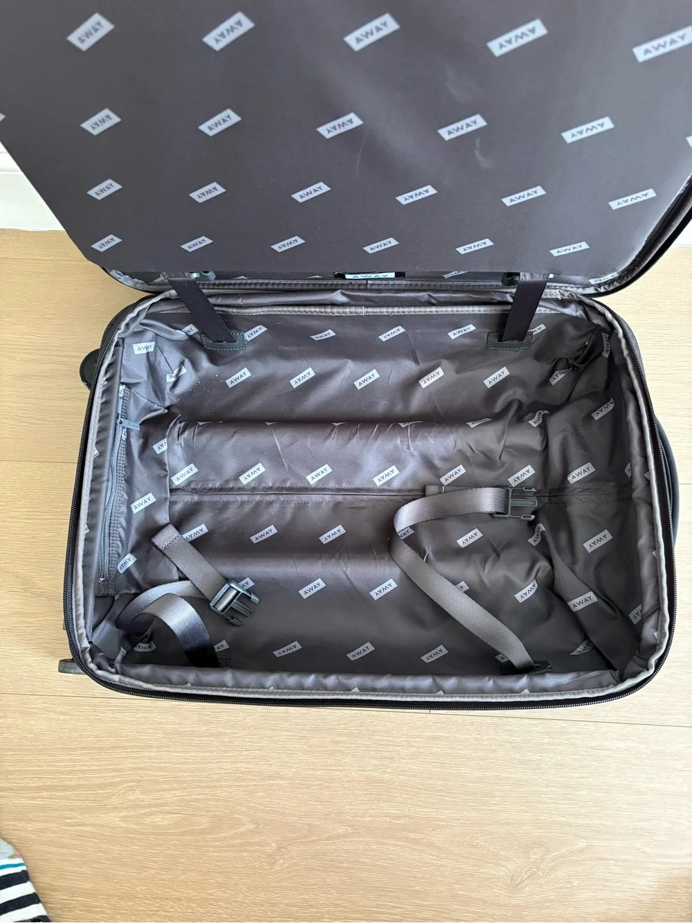 Away Black Carry-On Travel Case with Spinner Wheels (expandable collection)